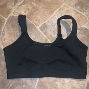 Fabletics L Athleisure black cutaway high impact sports bra
